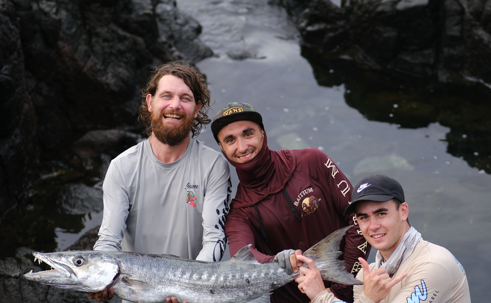 three men in Baitium shirts with fish - what fishing season is it?