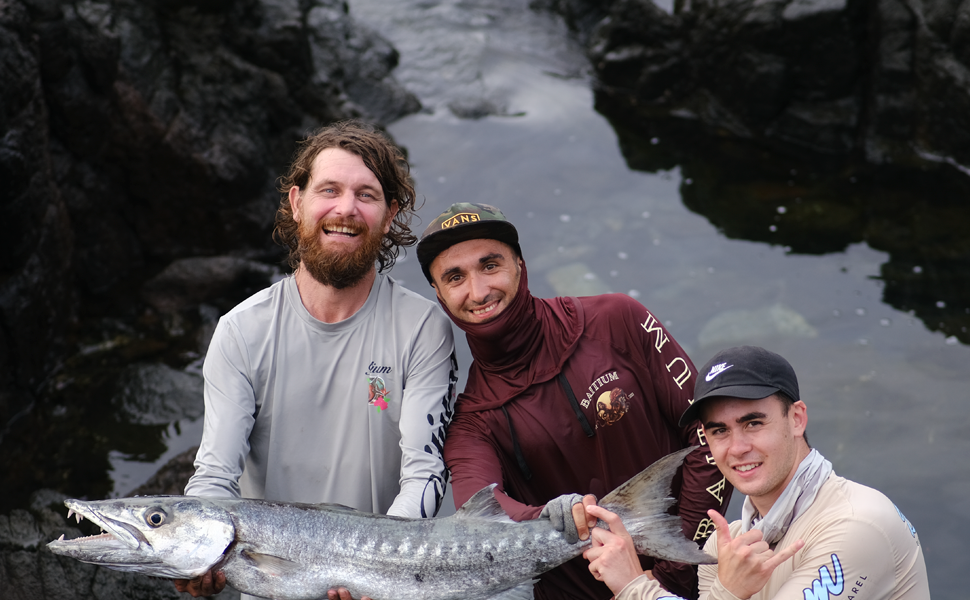 three men in Baitium shirts with fish - what fishing season is it? 